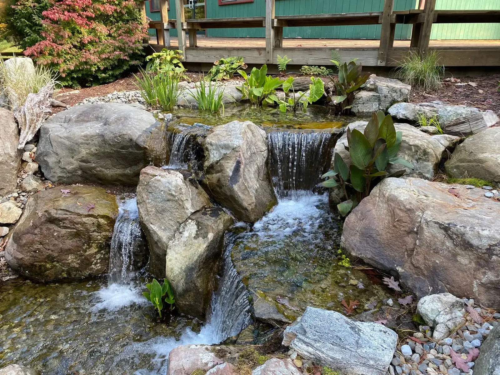 Pondless waterfall over natural stone on Long Island
