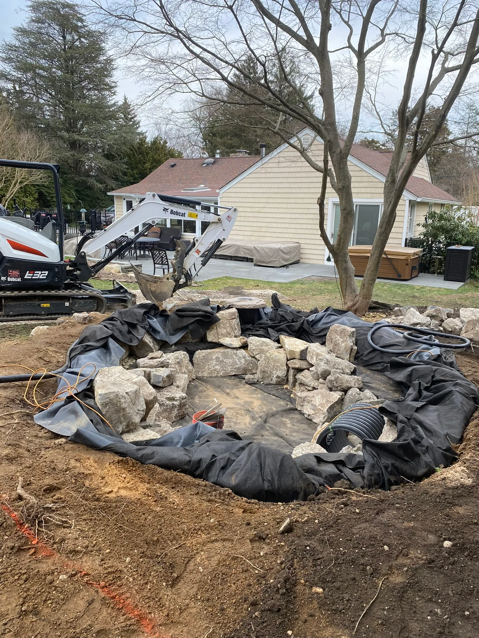 CS9 — stonework and liner installation
